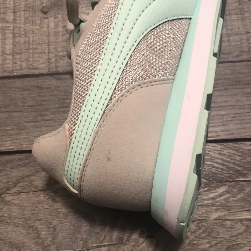 Puma retro runner sneakers in mint and light grey with soft foam support inserts
